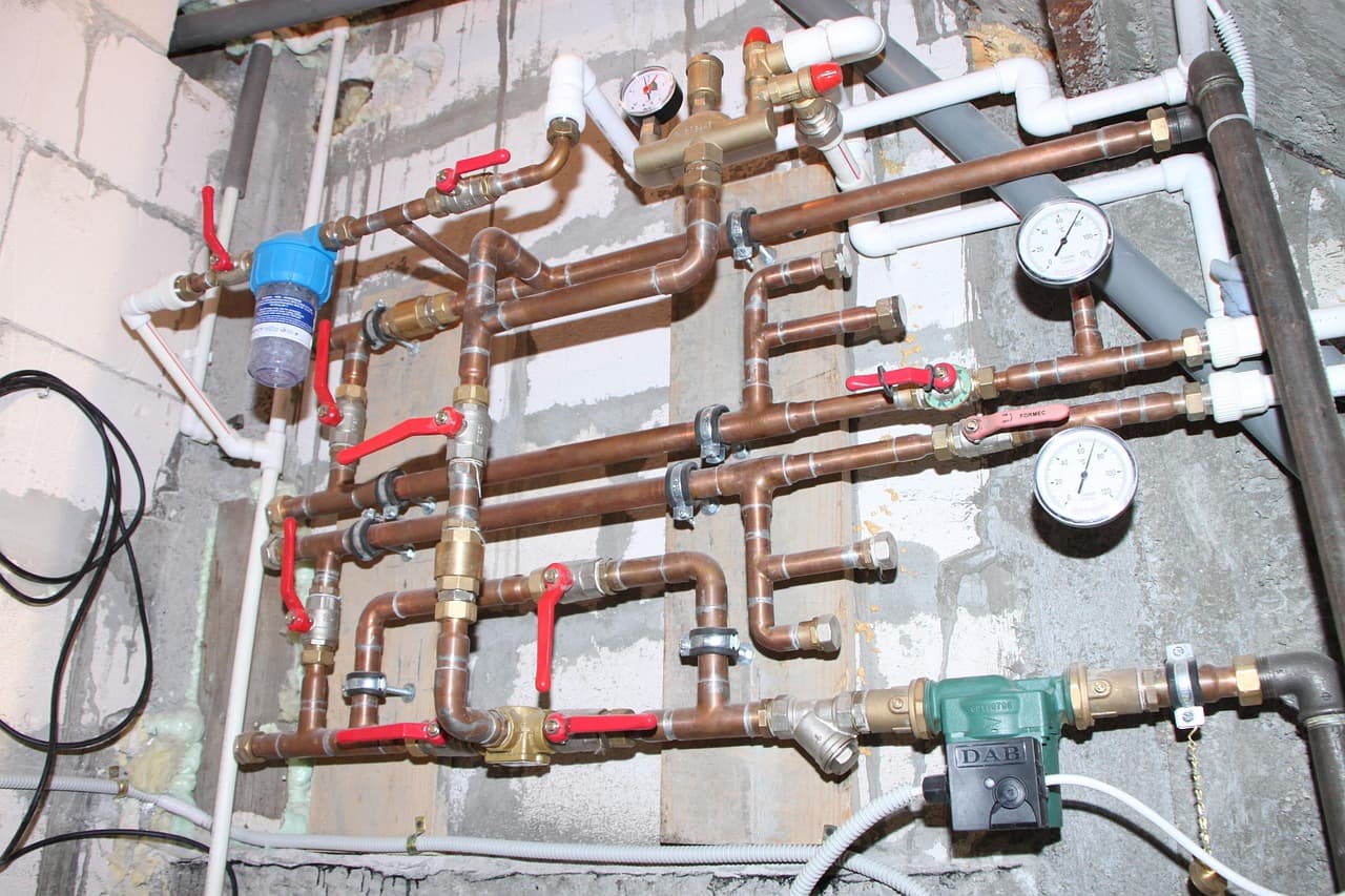 Copper heating pipework with valves and gauges